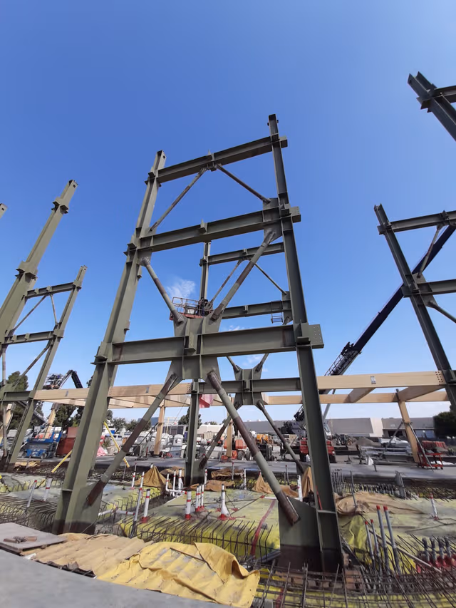 Galvanized steel construction elements used for building walls, showcasing durable corrosion protection through steel construction galvanizing by Coatinc US.