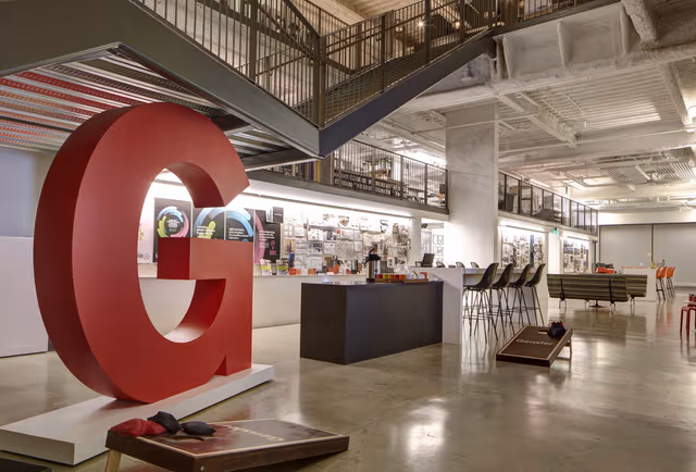 Interior steel construction with ceilings, cross beams, and staircases, showcasing galvanized steel elements for durable structural support by Coatinc US.