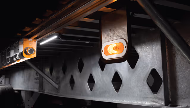 Individual galvanized steel part used in a trailer, highlighting long-lasting corrosion resistance and durability provided by Coatinc US.