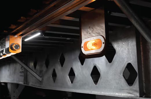 Individual galvanized steel part used in a trailer, highlighting long-lasting corrosion resistance and durability provided by Coatinc US.