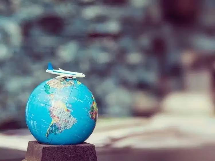 Toy plane on Globe