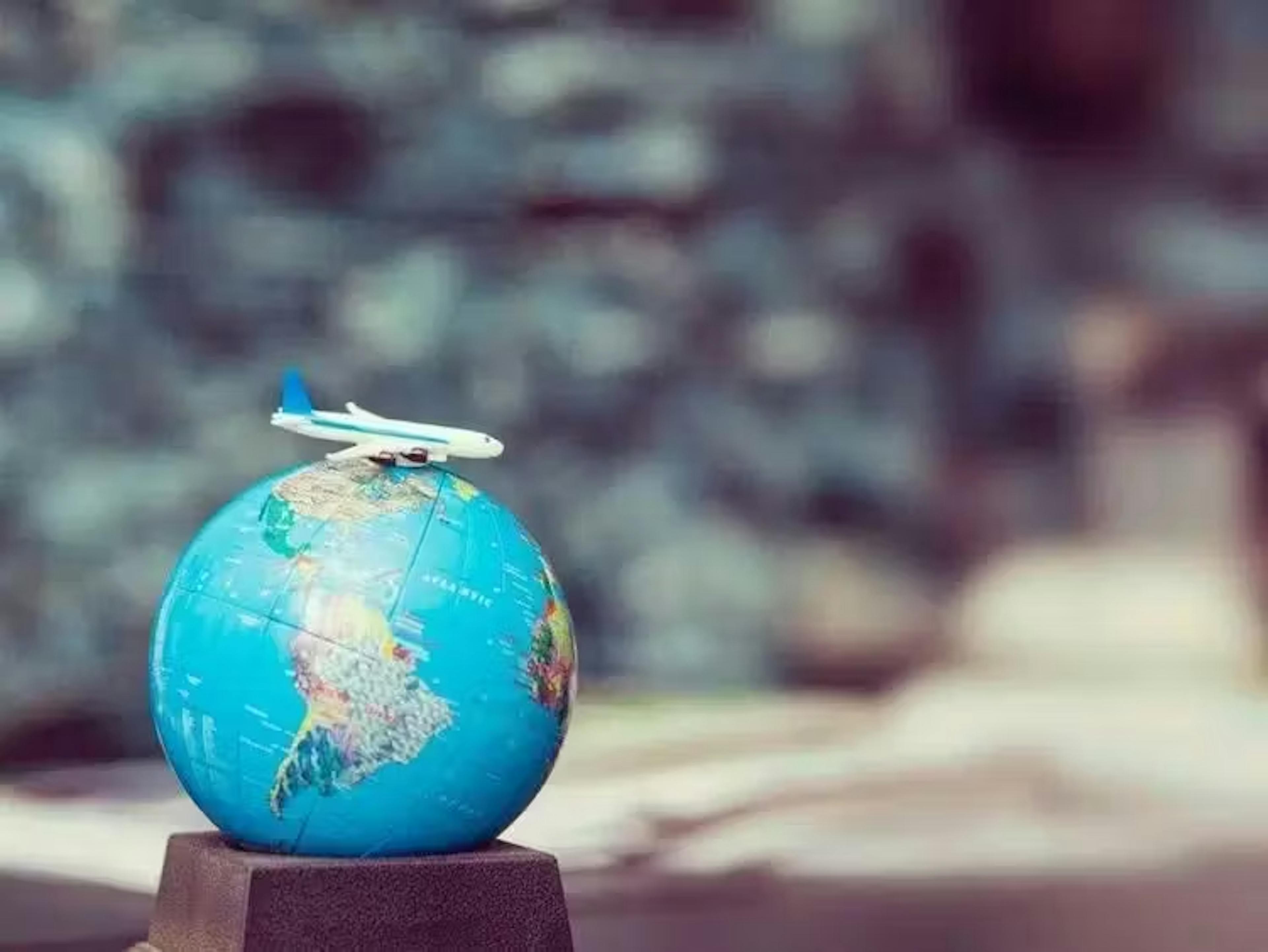 Toy plane on Globe