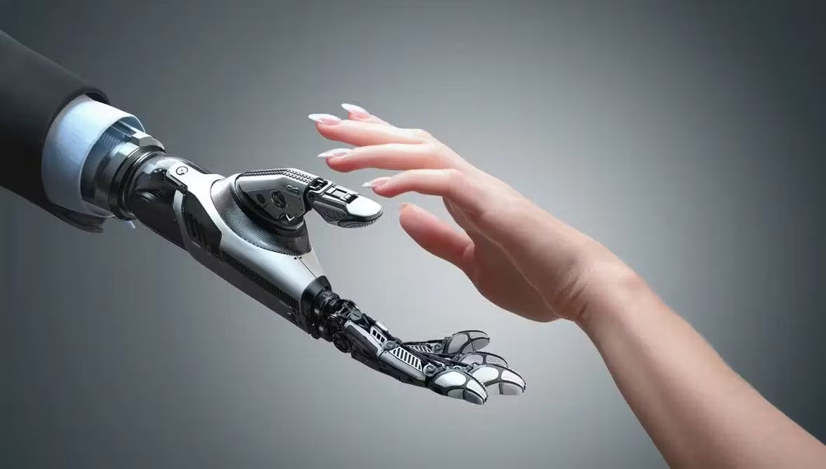 Robot and human shaking hands