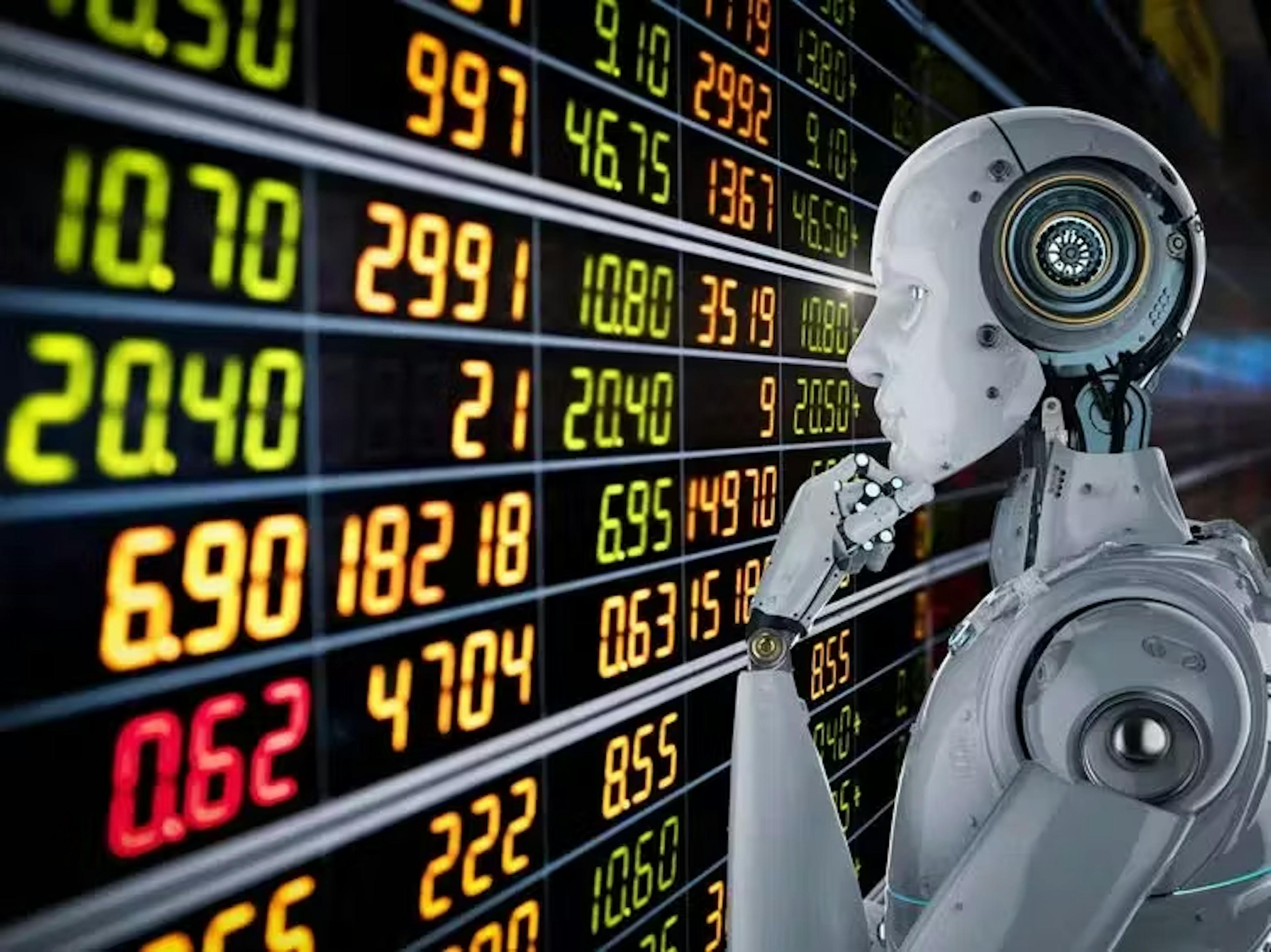 Robot lookin at charts
