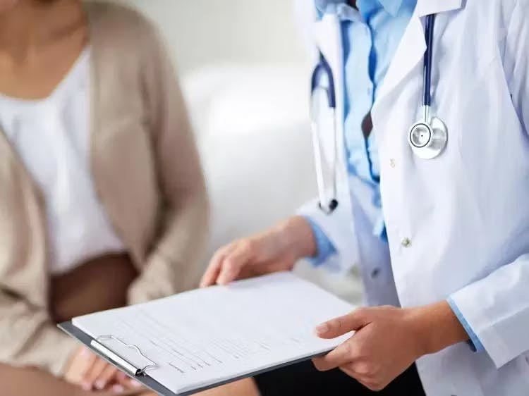 Doctor holding clipboard