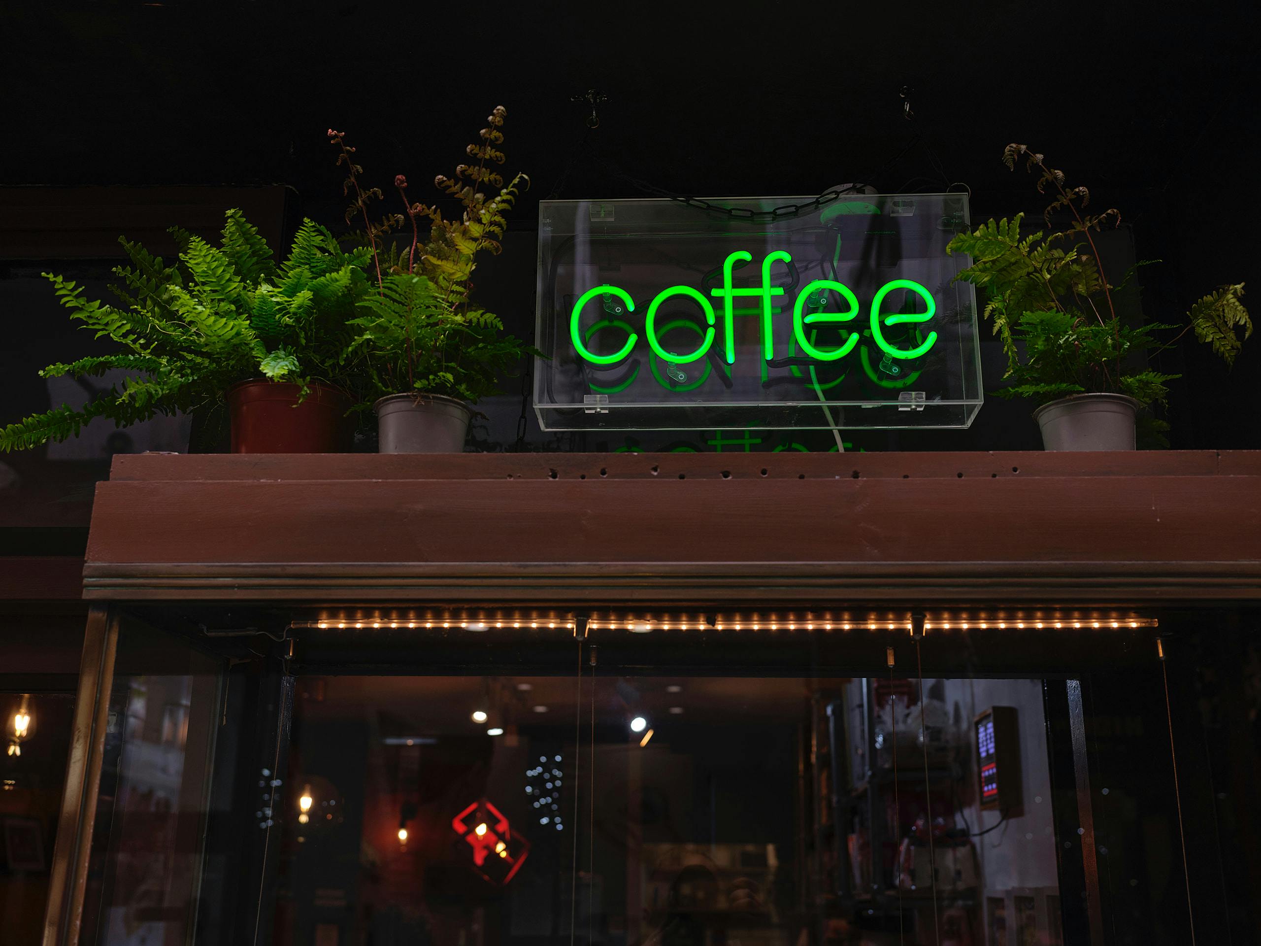Image of a neon sign reading 'coffee'.