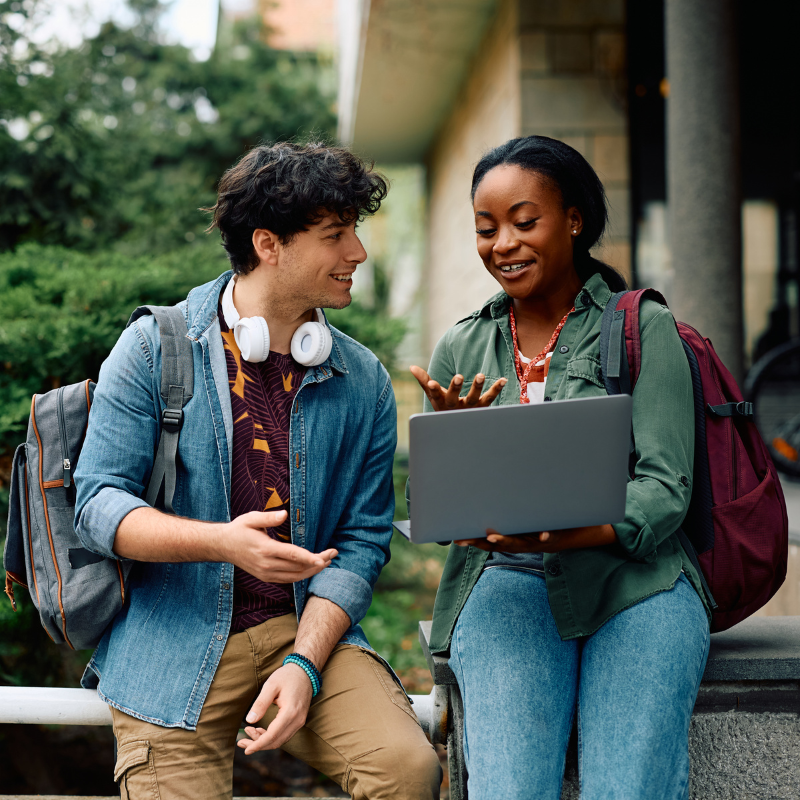 two students discussing OSHC insurance