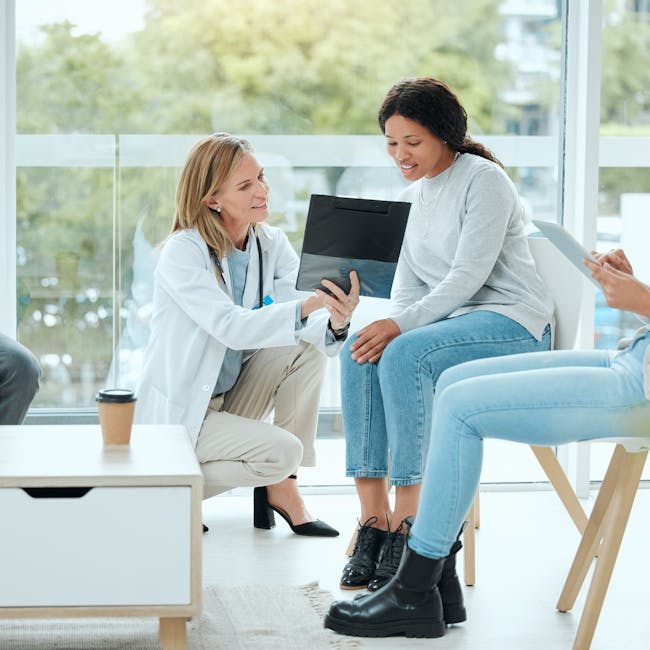 Patients discussing pre-existing conditions with their doctor