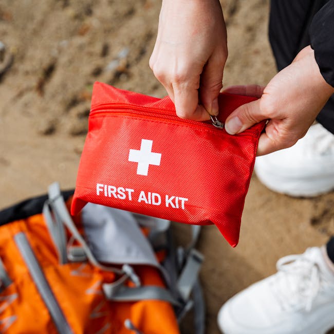 Someone using a First Aid Kit