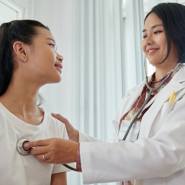 A nurse performs a routine medical examination on potential visa applicant.