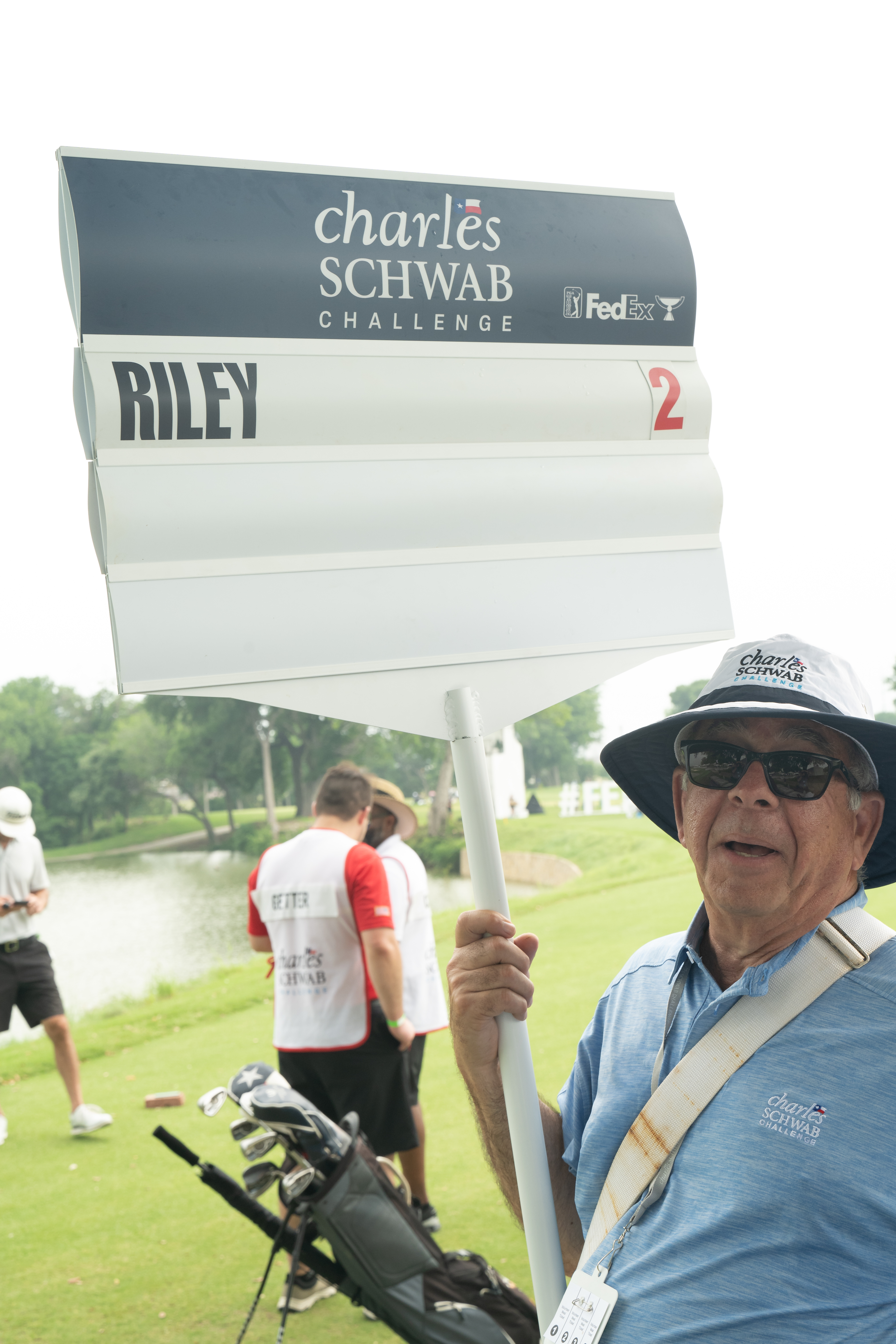 Volunteer with a sign