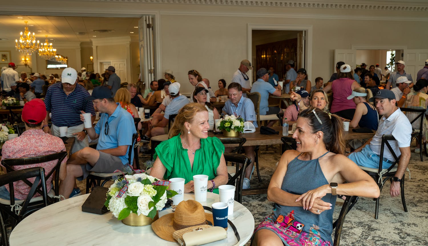 women visiting at table