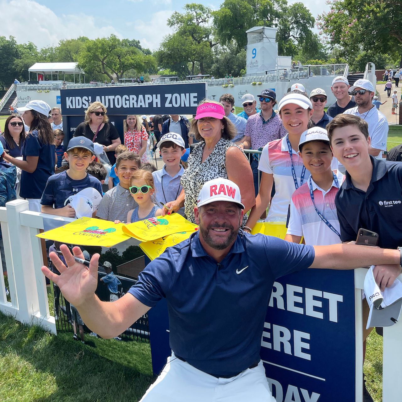 Pro giving autograph