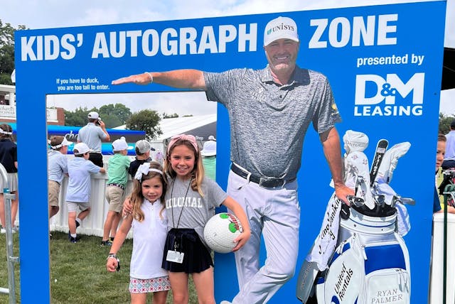 Girls getting autograph