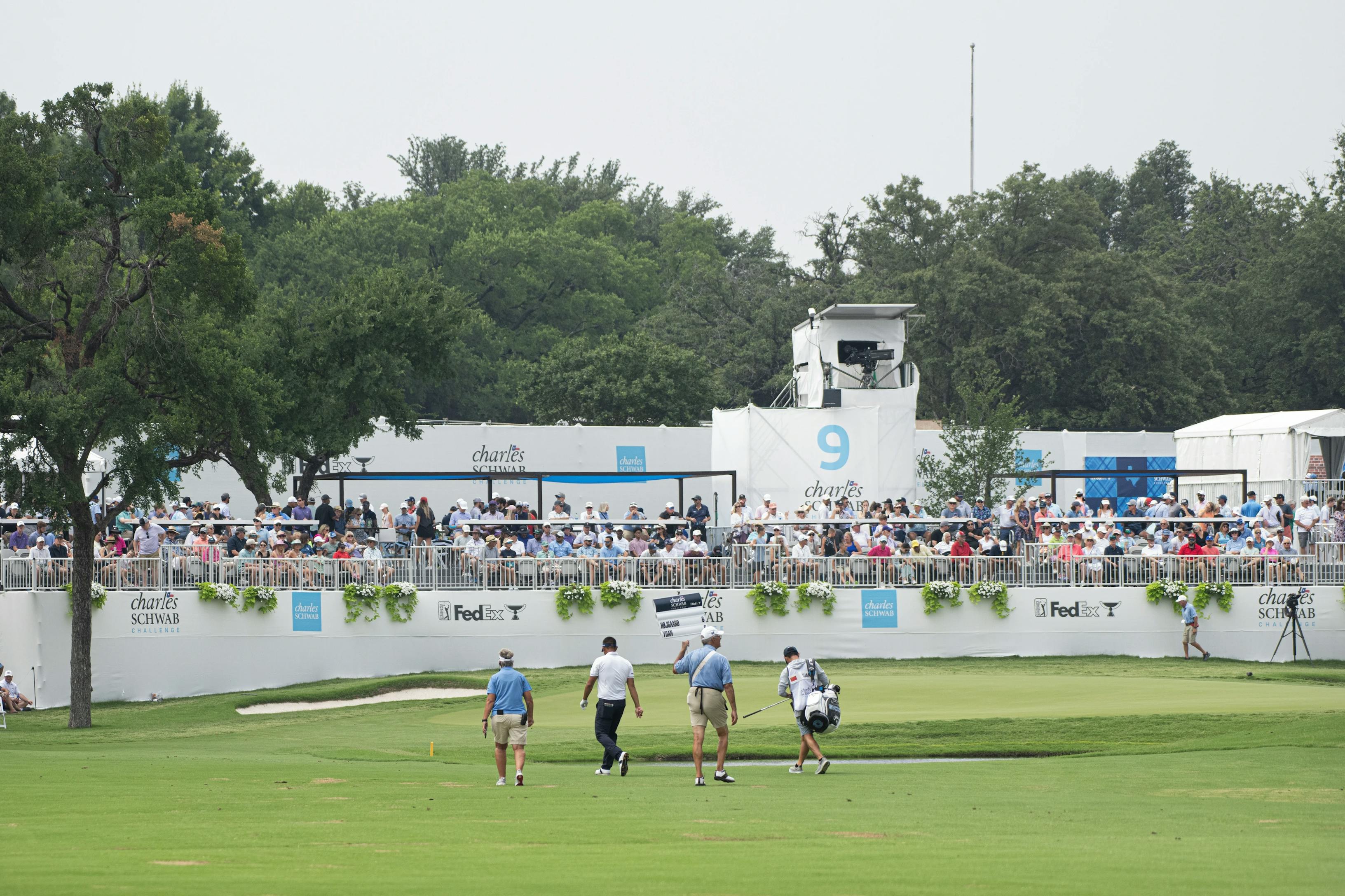 golfers walking
