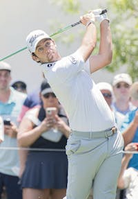 Davis Riley teeing off