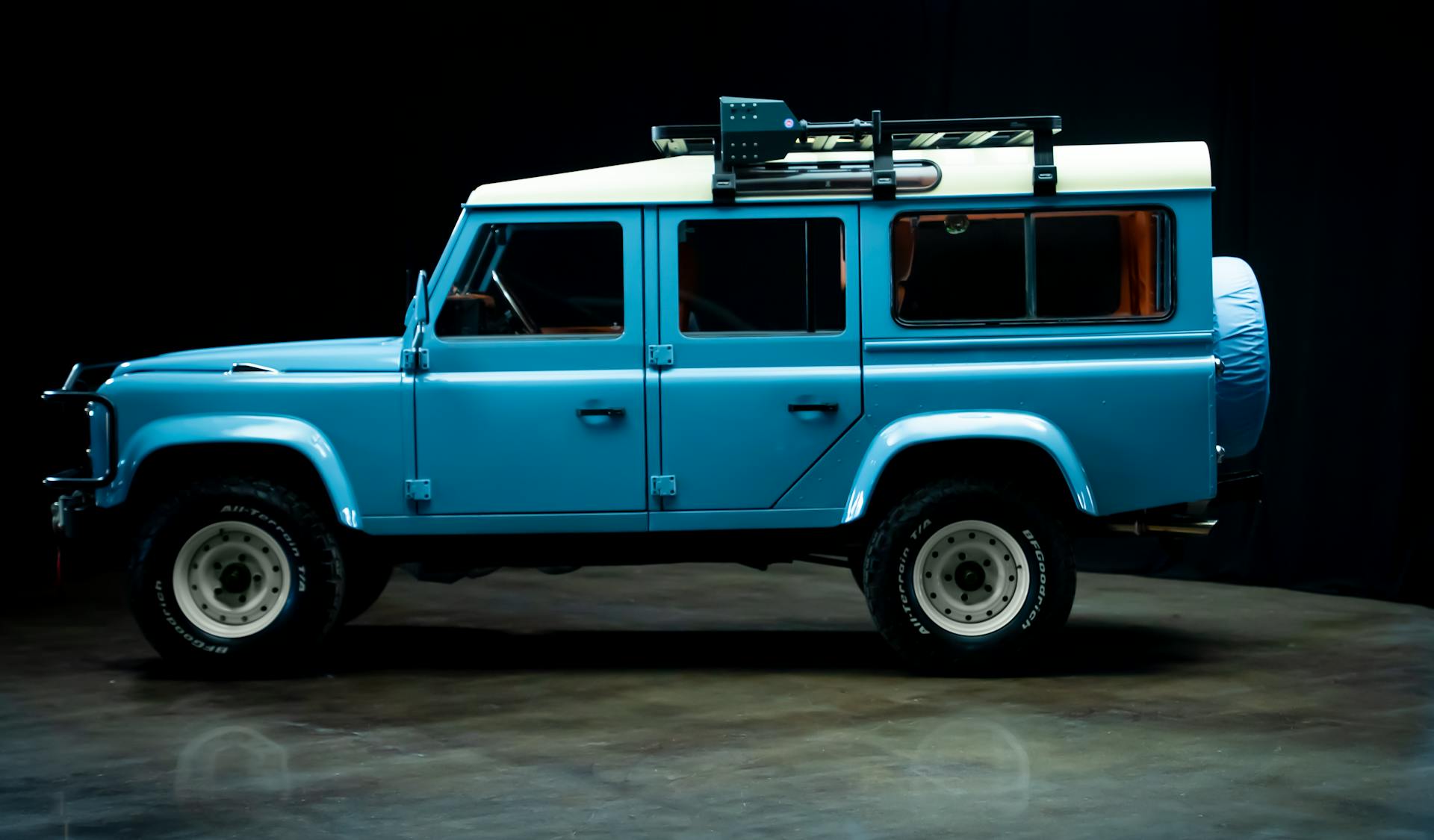 2025 Prize Car Defender Side View