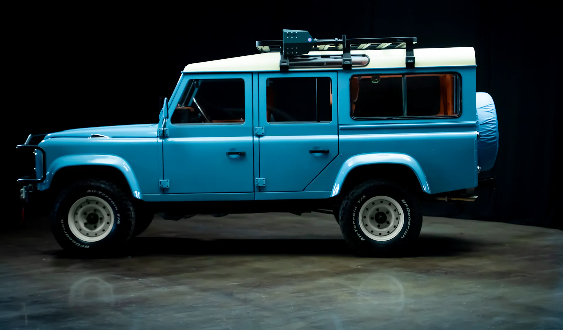 2025 Prize Car Defender Side View