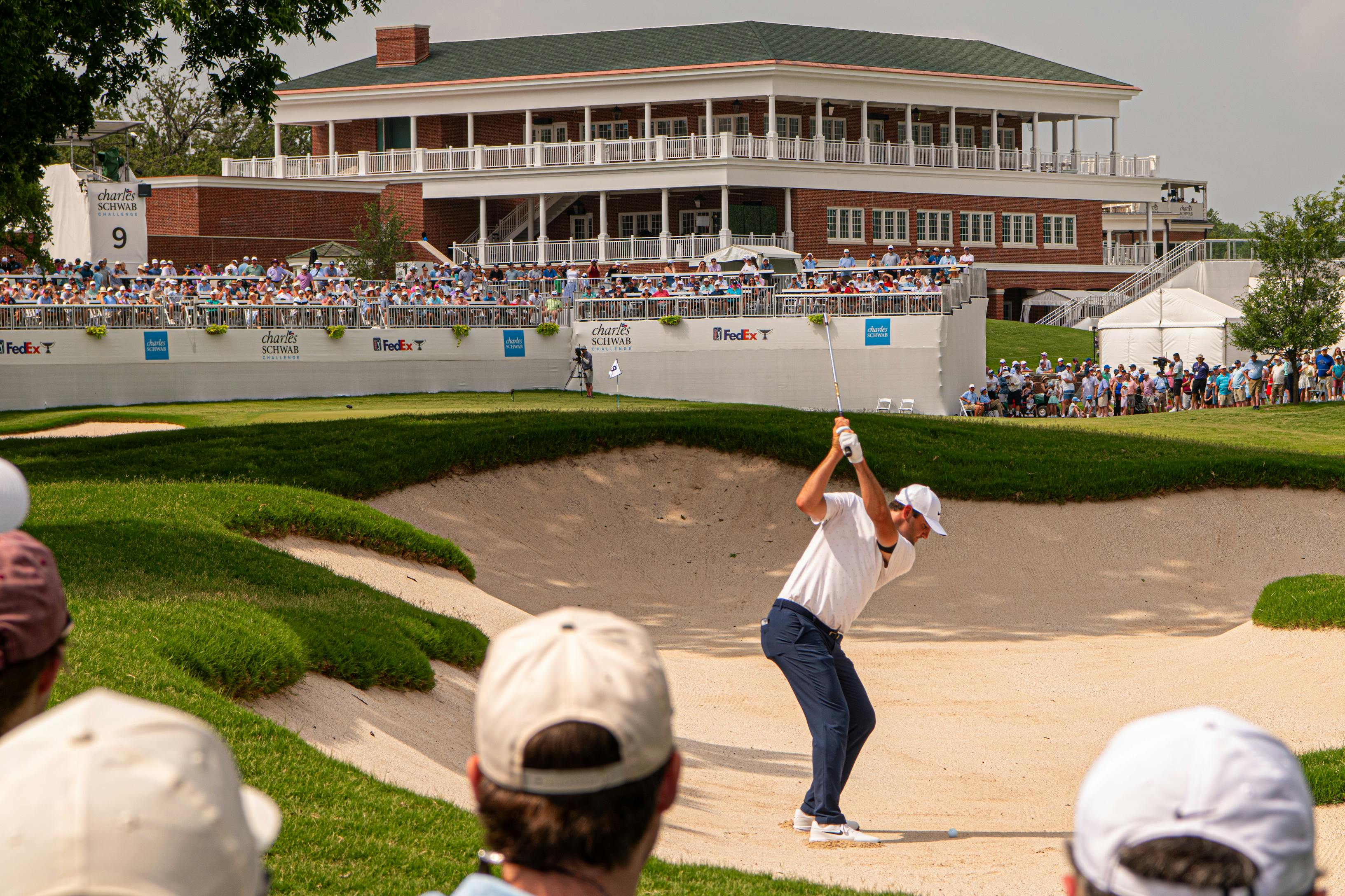 Golfer swinging club