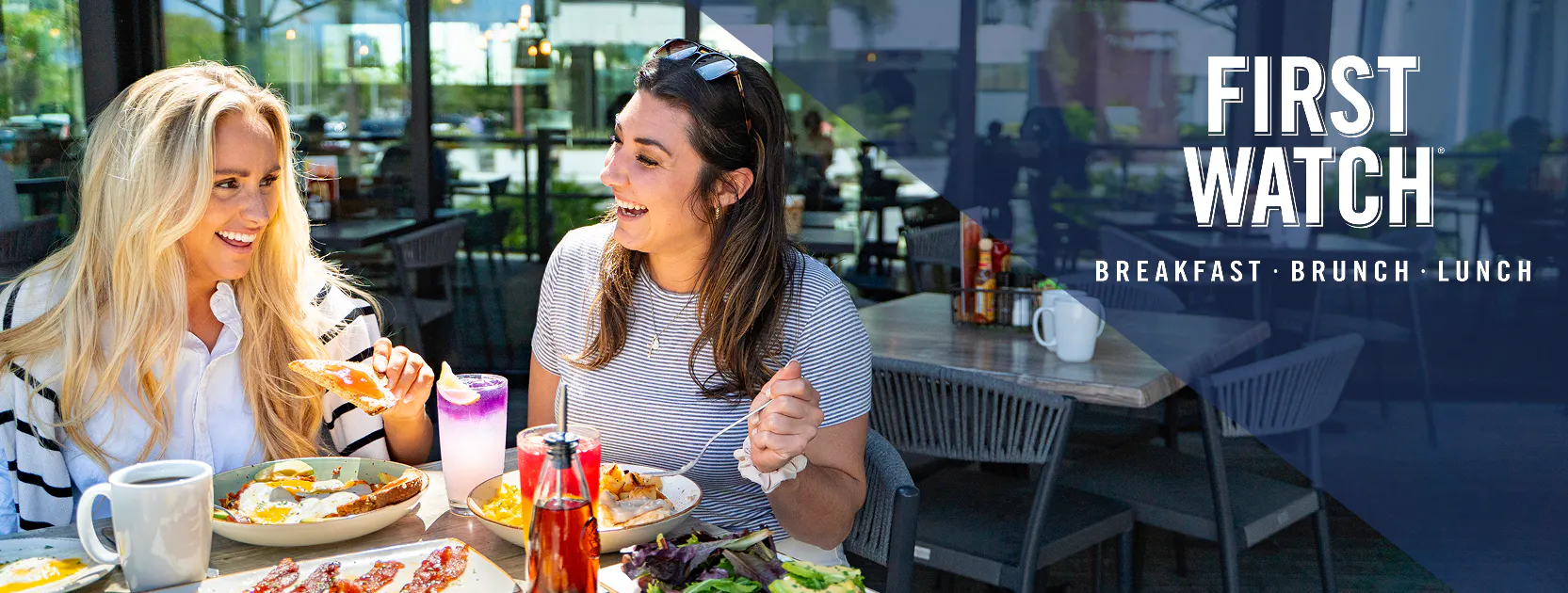 Two women eating breakfast