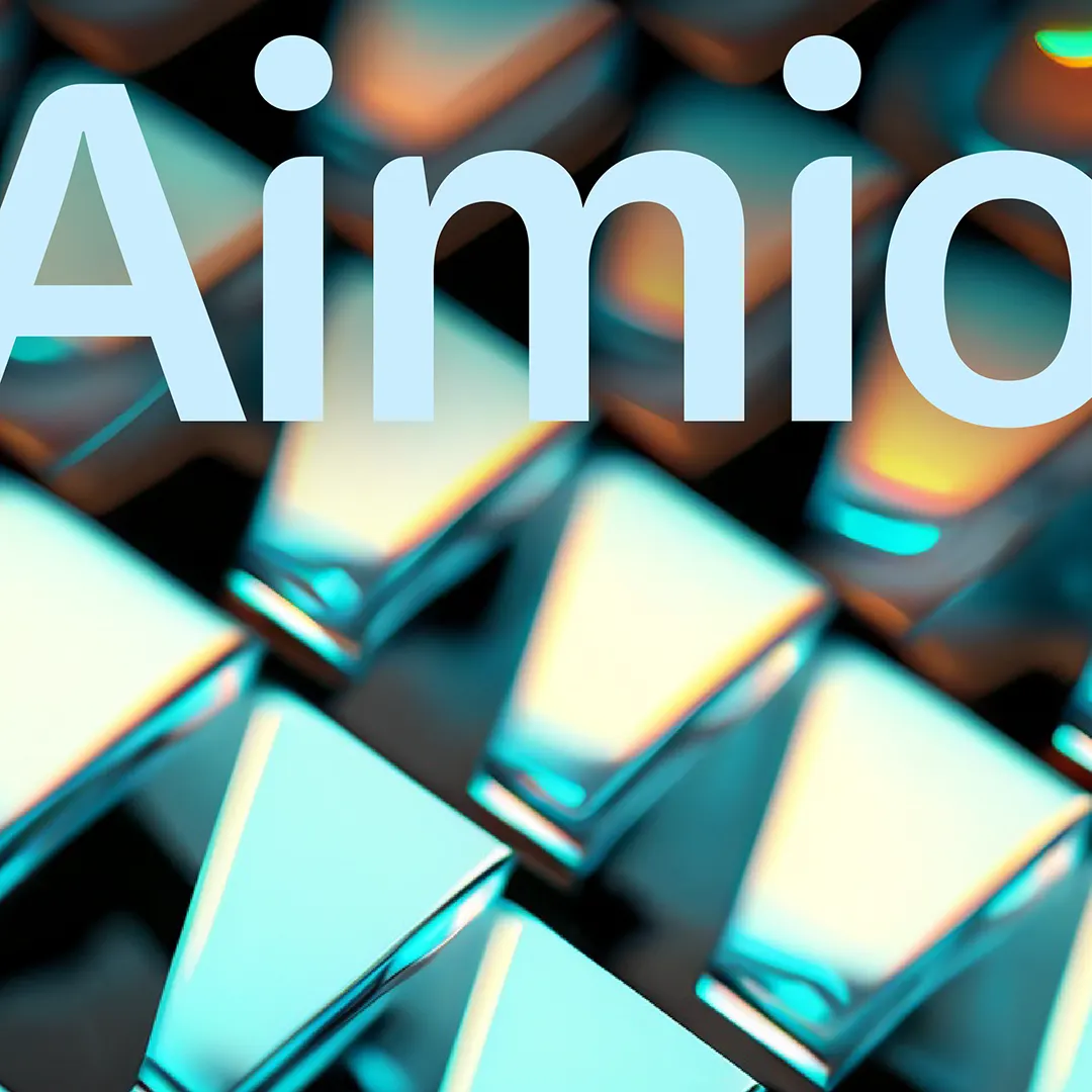 Texte « Aimio » en bleu clair, centré sur un fond abstrait de formes géométriques métalliques avec des reflets bleu et orange.