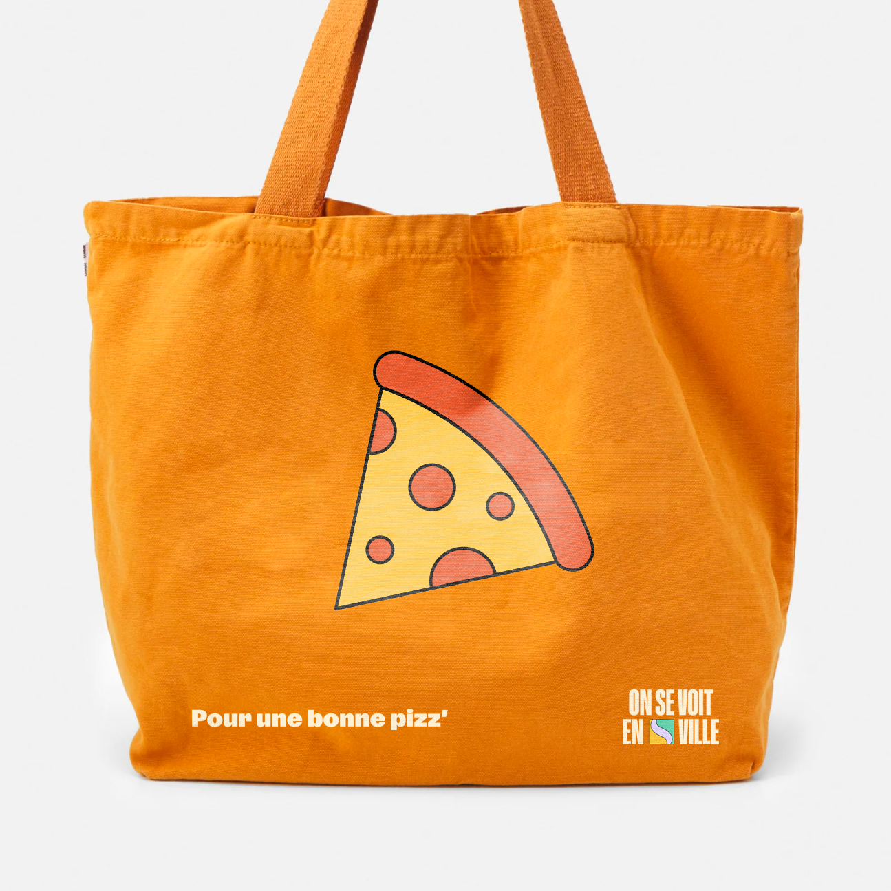 Sac en tissu de style totebag avec des éléments de l'identité visuelle de la campagne On se voit en ville