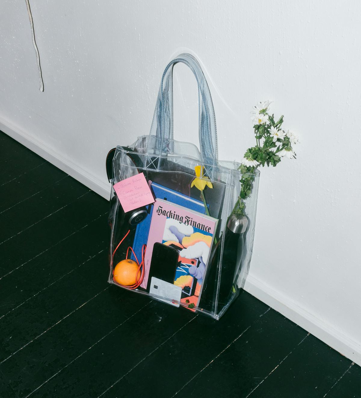 A clear bag containing an assortment of items