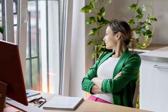 distracted eCommerce entrepreneur looks out the window