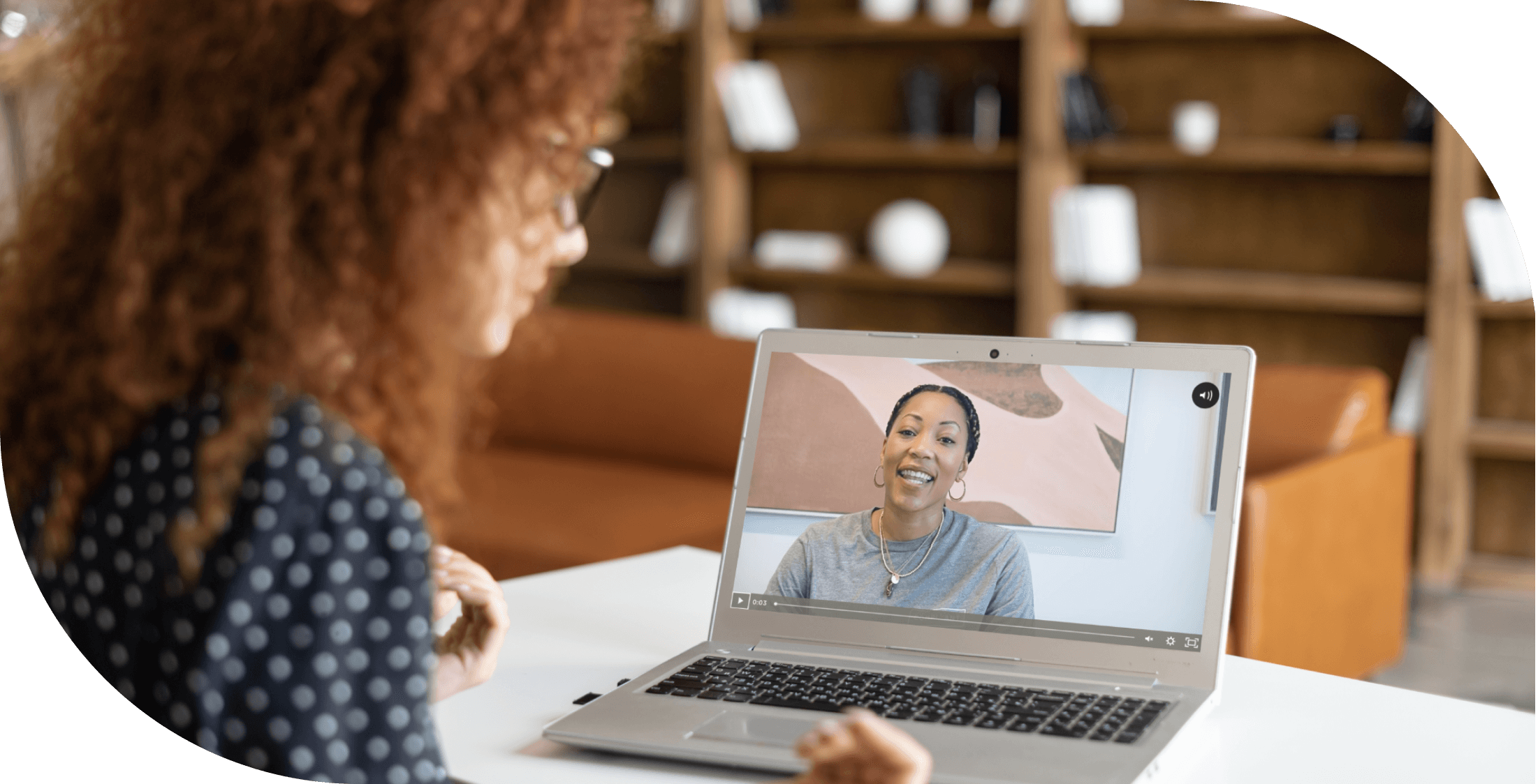 Photo of a person watching an online class on a laptop taught by Shiloh Johnson, founder and CEO of ComplYant, a small business tax tool
