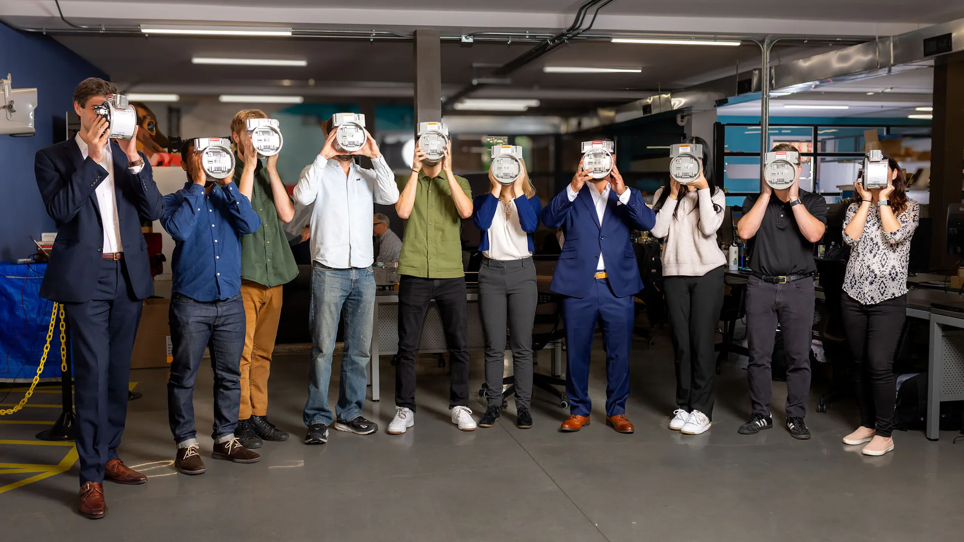 The ConnectDER team standing in their office in Philadelphia, PA.