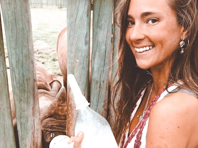 Magdalena Edwards: bottle feeding rhino