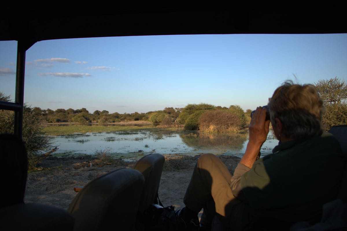 Male ACE volunteer viewing from vehicle