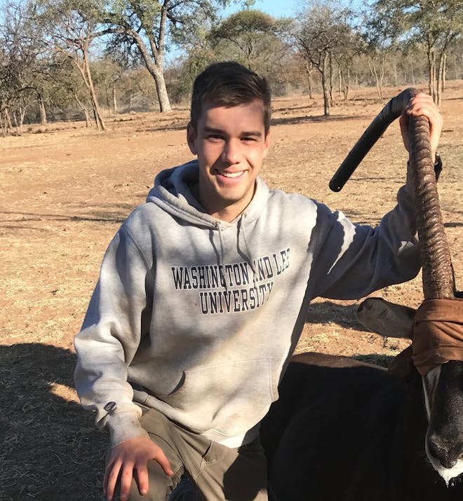 Jack Miller with a sedated antelope