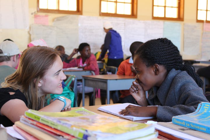 An ACE volunteer teaching in an African school