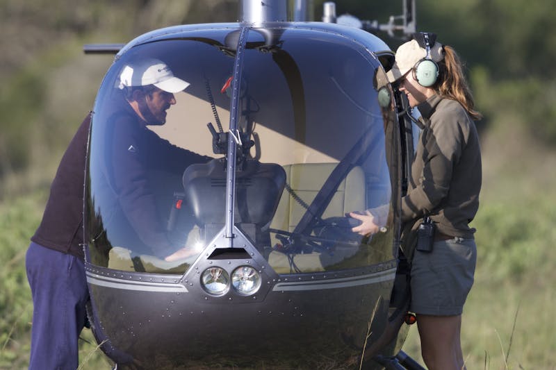 Cilla from Phinda with a helicopter pilot