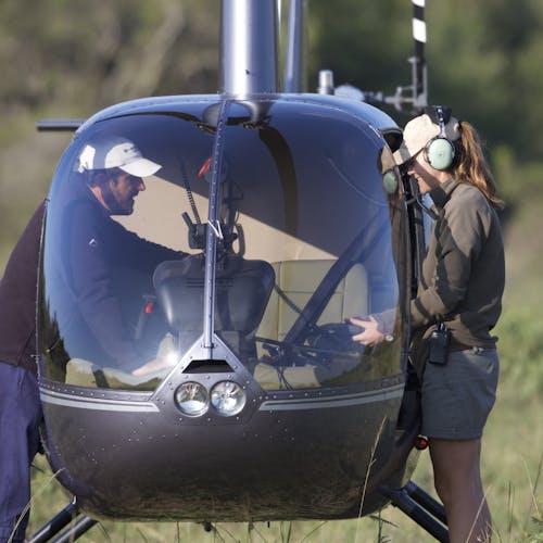 Cilla from Phinda with a helicopter pilot