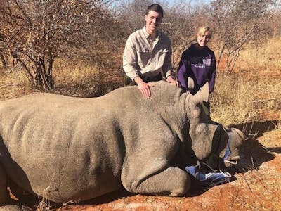 Jesse Burgess: posing with a sedated rhino