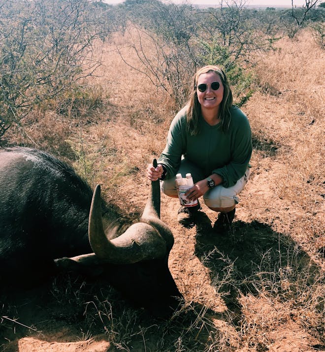 Micaela Chaffin: posing with a sedated buffalo