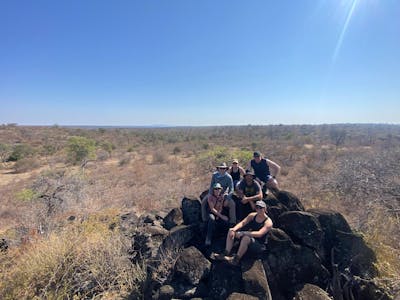 Sam Duggan: volunteer group posing landscape