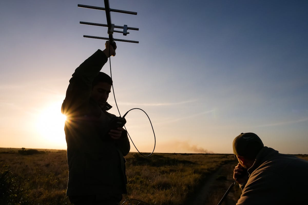 ACE volunteers using telemetry as the sun sets, photo taken by volunteer Kaden