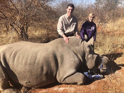 Megan Hoover: posing with a rhino