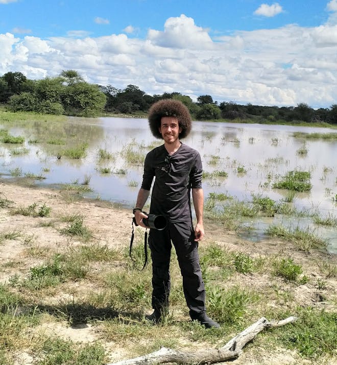 Tomer Admon: posing beside the water in the Okavango