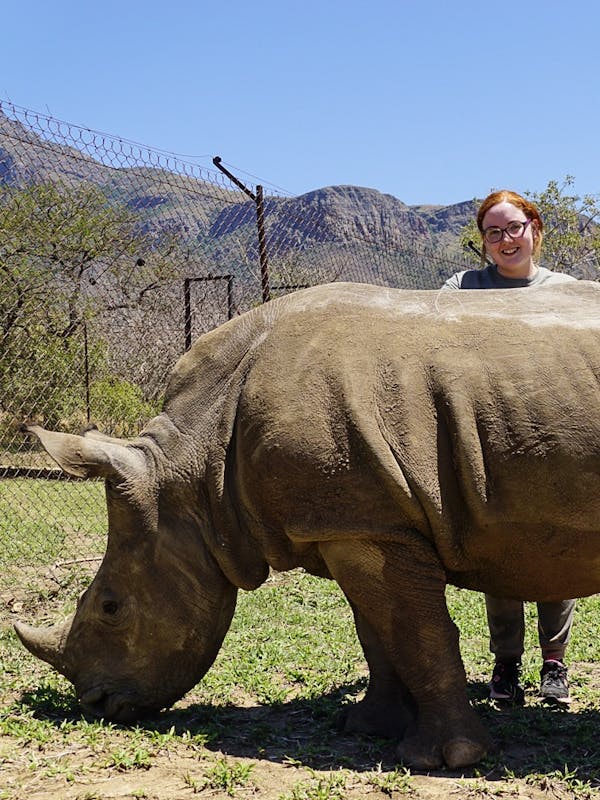 Megan Owens with a rhino