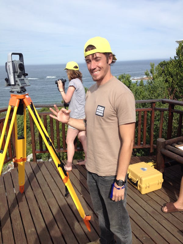 Student posing and monitoring the marine landscape