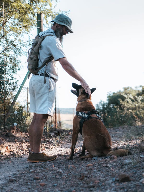 Anti-poaching dog with his trainer