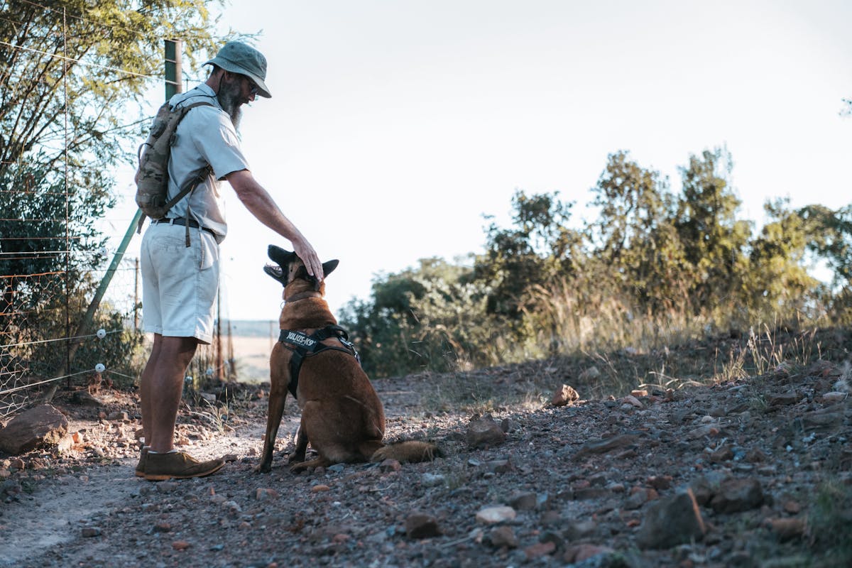 Anti-poaching dog with his trainer