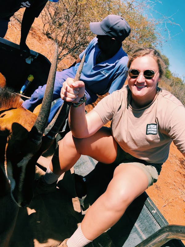 Micaela Chaffin: posing with an antelope