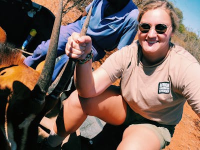 Micaela Chaffin: posing with an antelope