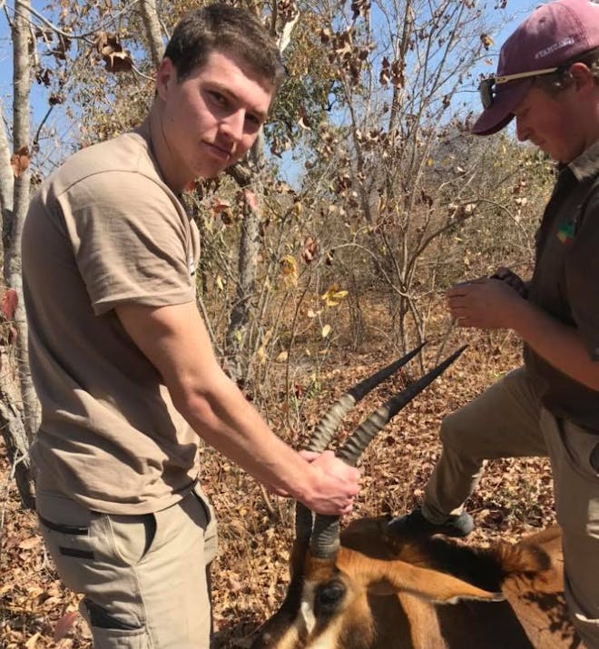 Jesse Burgess: posing with an antelope