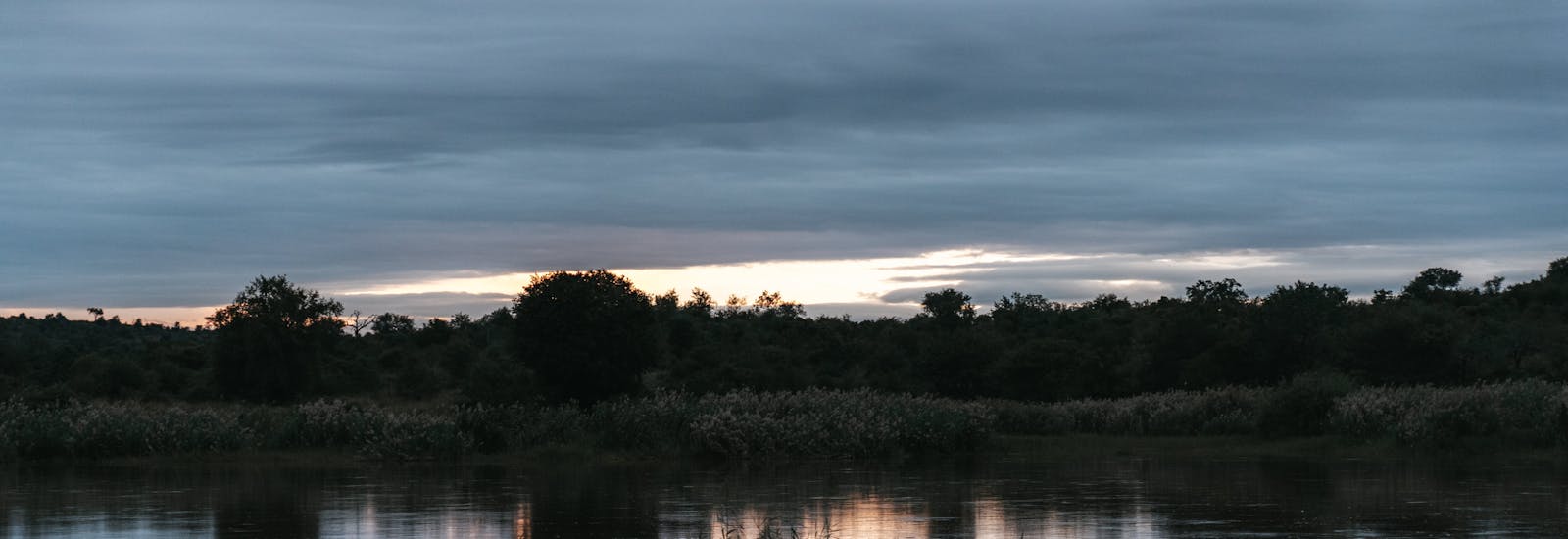 Sun setting over the water